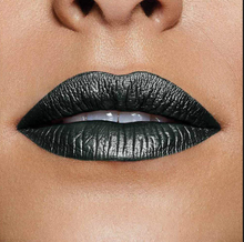Maybelline Metallic Foil Lipstick in shade 130 Labyrinth with a rich metallic finish and bold, shimmering color in sleek lipstick packaging.