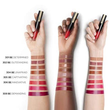 Swatch of L’Oréal Paris Brilliant Signature Lip Gloss in shade 308 Be Demanding showcasing its rich color, lightweight texture, and glossy high-shine finish.