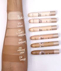 Maybelline Dream Brightening Creamy Concealer in 60 Deep providing smooth, buildable coverage with a natural-looking finish.