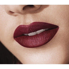 Maybelline Color Sensational Powder Matte Lipstick in 05 Cruel Ruby delivering intense color with a smooth ultra matte finish.