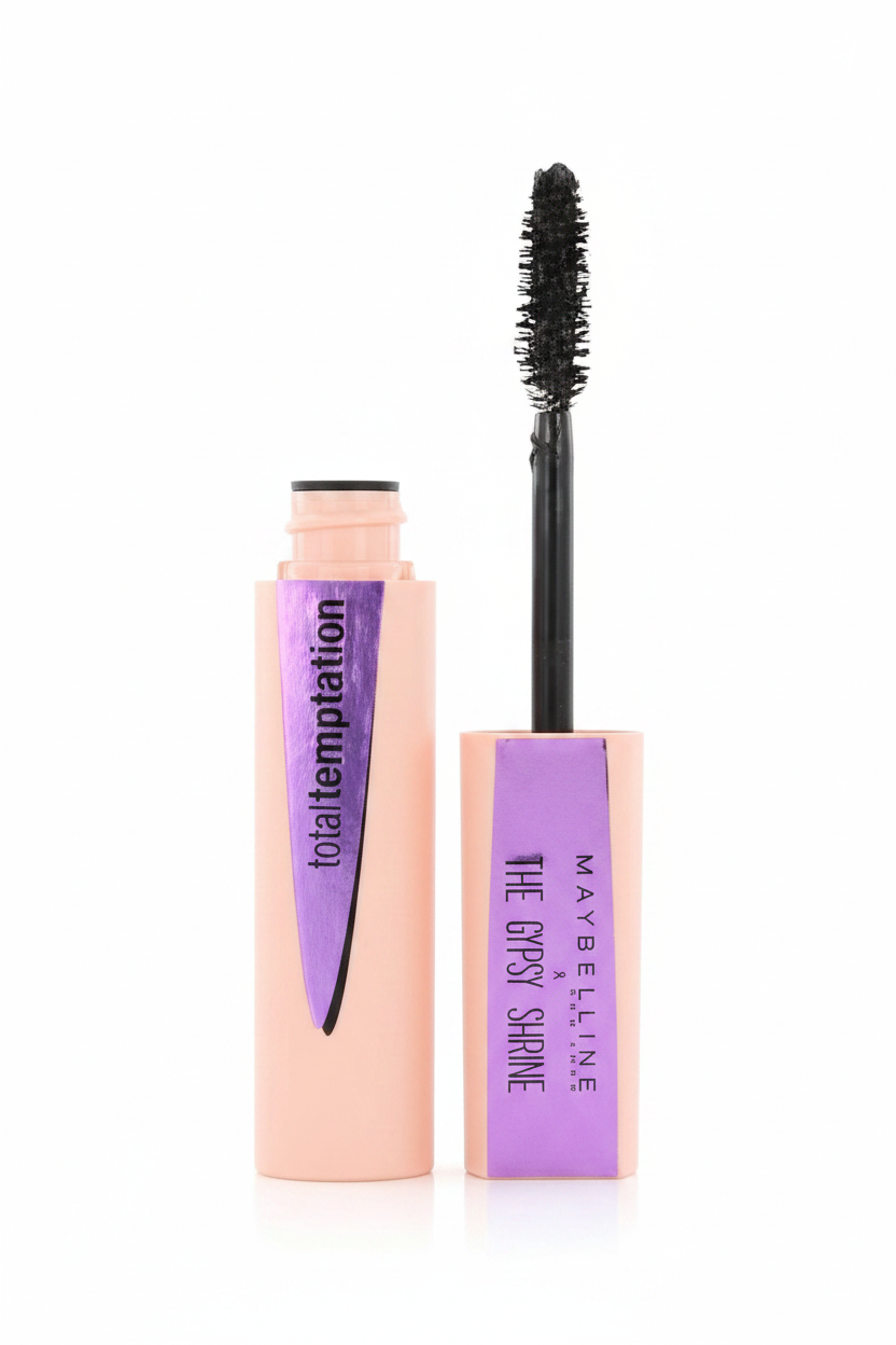 Close-up of Maybelline The Gypsy Shrine Total Temptation Mascara in shade Black showcasing the full-bristle mascara wand for even coating and lash separation.