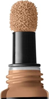 Close-up of NYX Professional Makeup Born To Glow Concealer in shade 12.7 Neutral Tan showcasing the precision applicator and creamy liquid concealer formula.