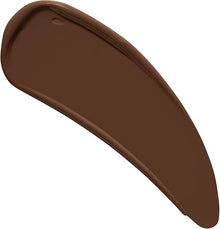 Swatch of NYX Professional Makeup Born To Glow Naturally Radiant Foundation in shade 22.7 Deep Walnut showcasing its deep walnut tone, creamy texture, and radiant-looking finish.
