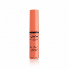 NYX Professional Makeup Butter Gloss in shade 23 Peach Crisp shown with the applicator removed, highlighting its creamy gloss formula for precise application.