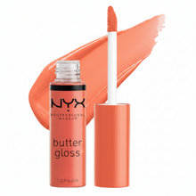 NYX Professional Makeup Butter Gloss in shade 23 Peach Crisp displayed in its tube, featuring a smooth lip gloss with a non-sticky formula.