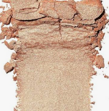 Revlon SkinLights Prismatic Highlighter 202 Twilight Gleam featuring a lightweight silky powder formula and crystal-like pigments.