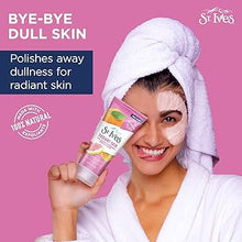 St. Ives Even & Bright Face Scrub with Pink Lemon & Mandarin Orange shown with the cap open, highlighting the tube design and exfoliating scrub formula.